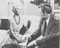 A production still of Turner wearing haute couture in Imitation of Life.