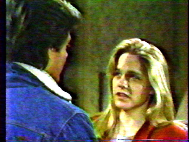 Screen shot of Frank Runyeon and Lindsay Frost in As the World Turns (1985).