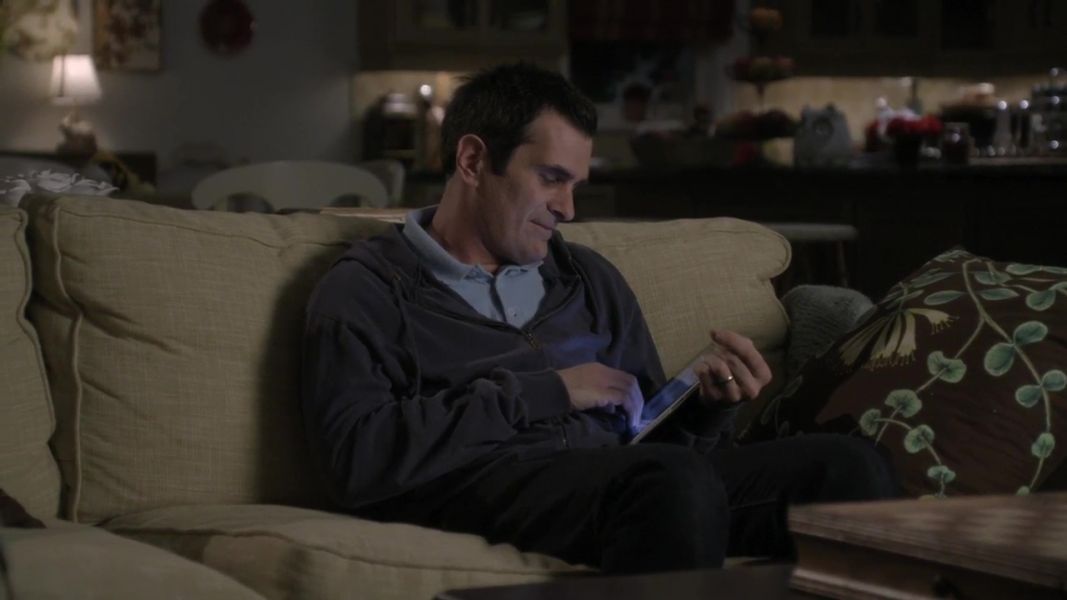 Phil and his iPad, in Modern Family.